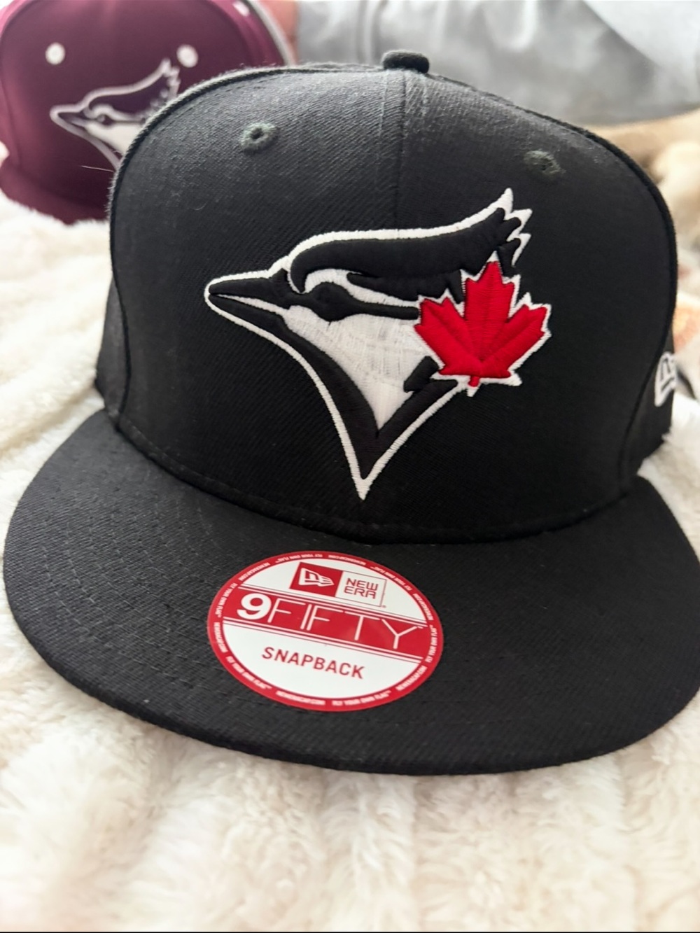 New Era Black Toronto Blue Jays Snapback Hat with Red Maple Leaf